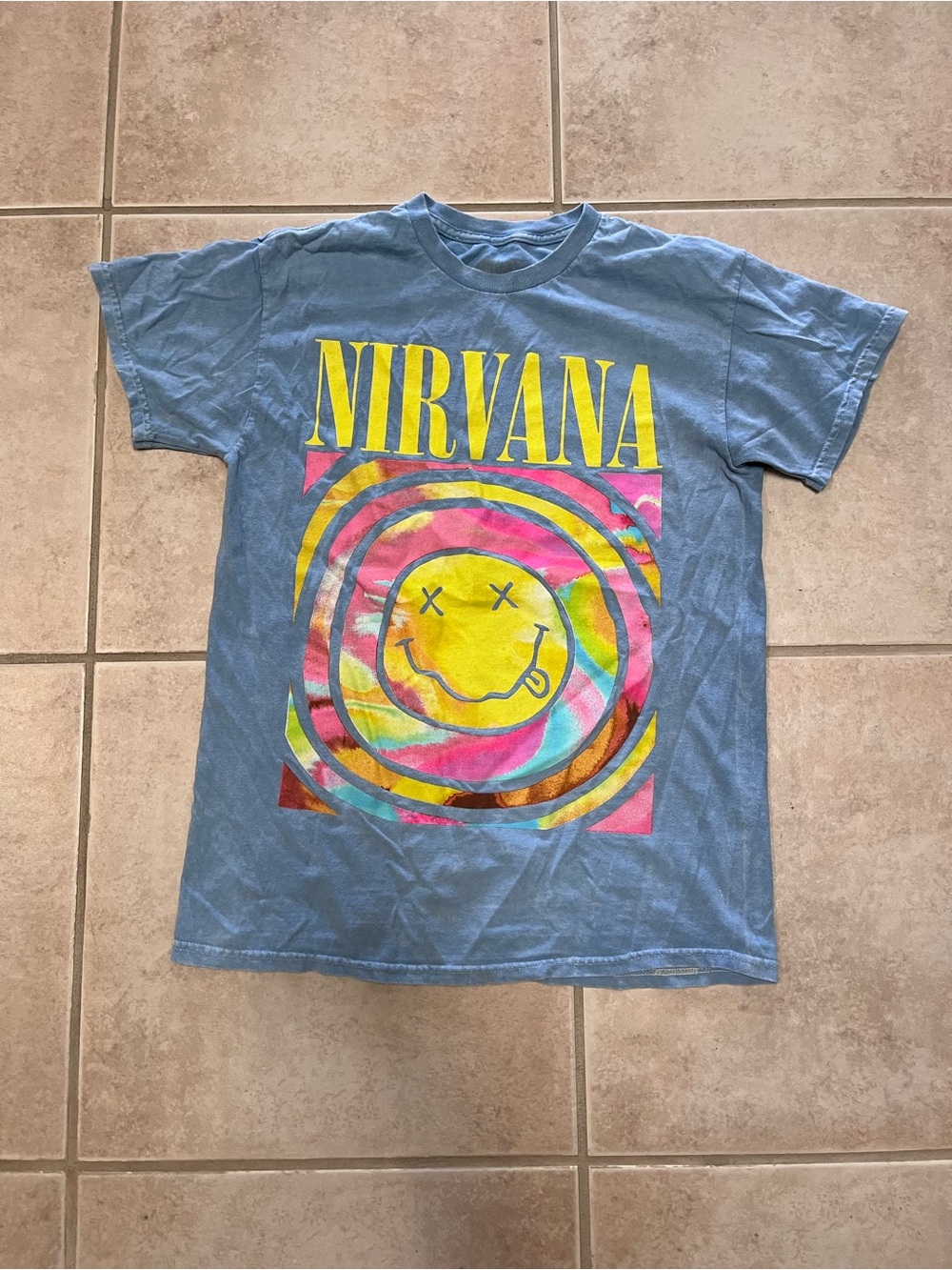 NIRVANA Blue Tee with Yellow Smiley and Multicolor Tie-Dye Graphic